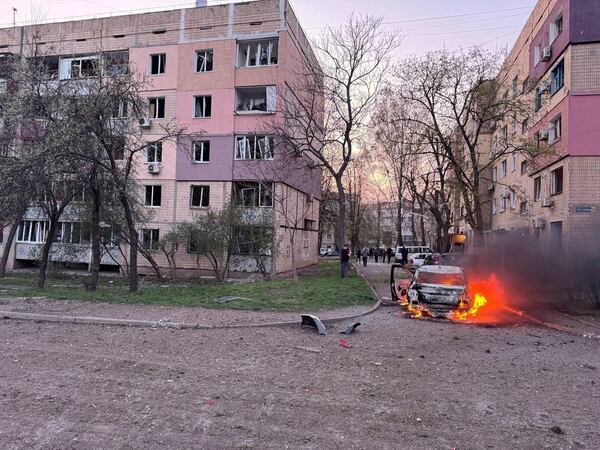 In this photo provided by the Ukrainian Emergency Service, a car burns following Russia's missile attack that killed 14 civilians including six children in Kryvyi Rih, Ukraine, Friday, April 4, 2025. (Ukrainian Emergency Service via AP)