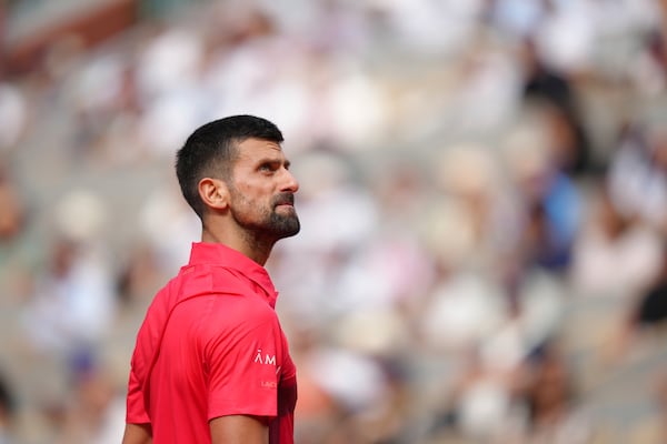 Serbia's Novak Djokovic reacts as he plays against Britain's Cameron Norrie during their fourth round match of the French Tennis Open at the Roland-Garros stadium in Paris, Monday, June 2, 2025. (AP Photo/Aurelien Morissard)