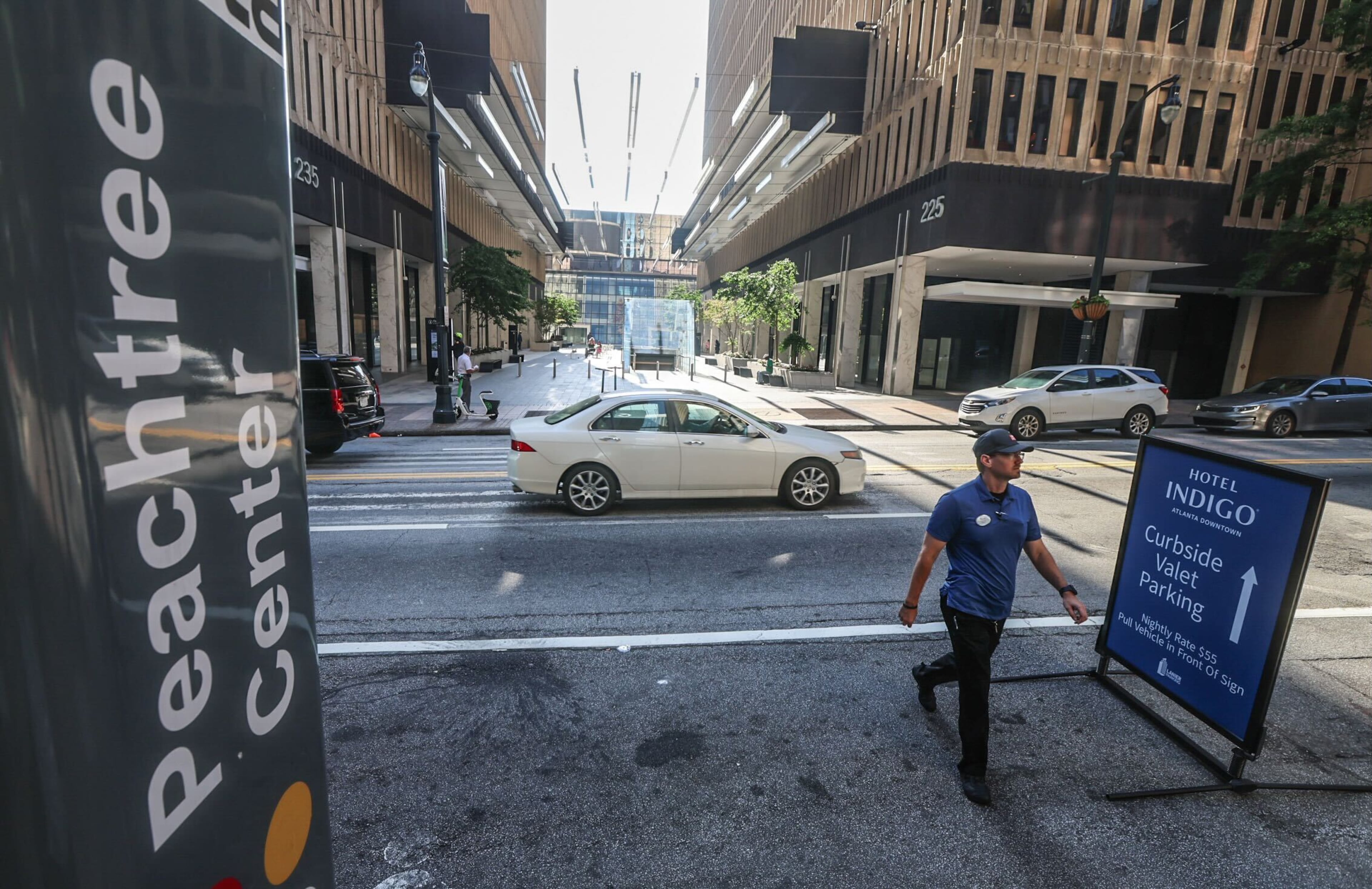 Several towers at Peachtree Center, seen here from its MARTA station entrance, have been listed for sale. (John Spink/AJC 2024)