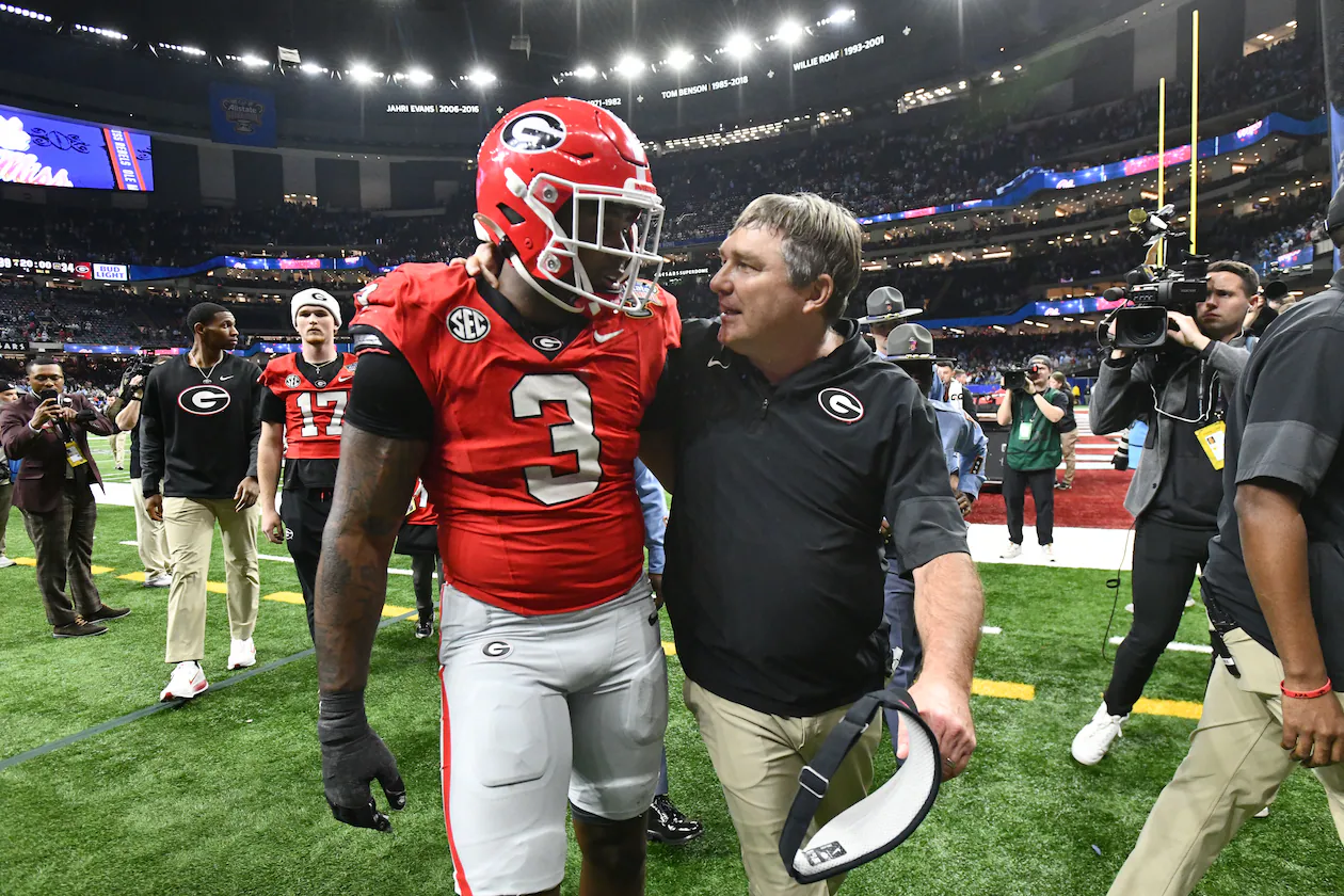 Georgia head coach Kirby Smart comforts Georgia linebacker CJ Allen as they leave after Ole Miss beat Georgia during the Sugar Bowl NCAA college football playoff quarterfinal game at the Caesars Superdome, Thursday, Jan. 1, 2026, in New Orleans. (Hyosub Shin/AJC)