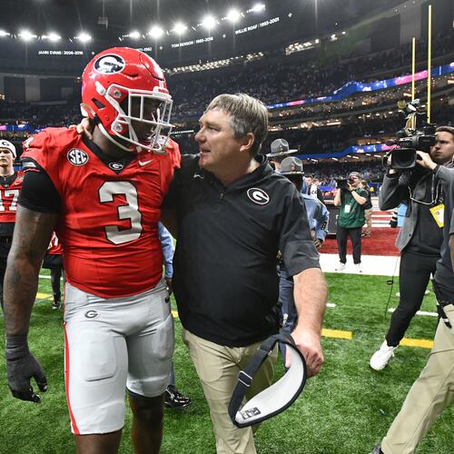 Georgia head coach Kirby Smart comforts Georgia linebacker CJ Allen as they leave after Ole Miss beat Georgia during the Sugar Bowl NCAA college football playoff quarterfinal game at the Caesars Superdome, Thursday, Jan. 1, 2026, in New Orleans. (Hyosub Shin/AJC)