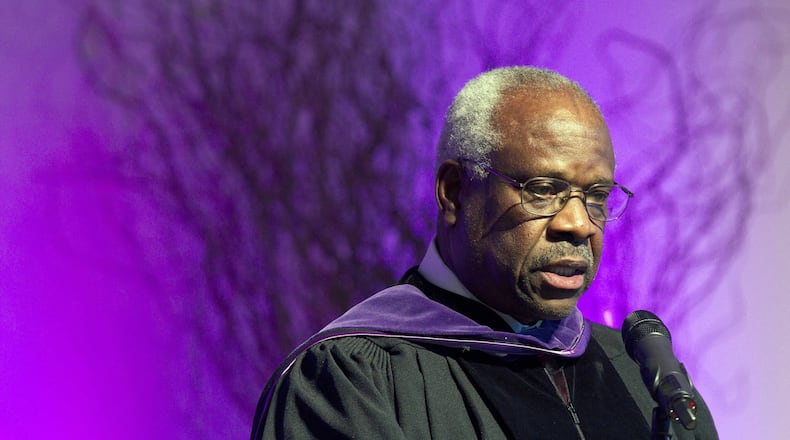In this Jan. 26, 2012 file photo, Supreme Court Justice Clarence Thomas speaks at College of the Holy Cross in Worcester, Mass. (AP Photo/Michael Dwyer, File)