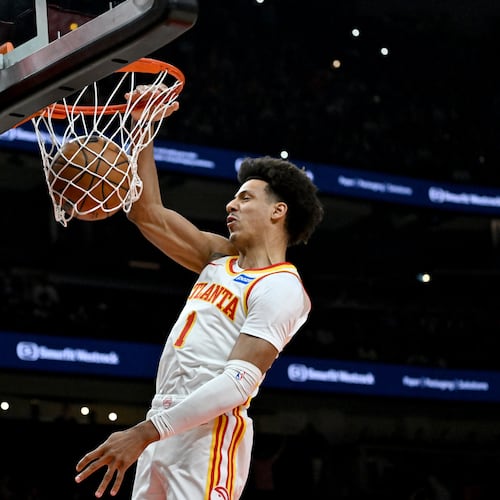 Hawks forward Jalen Johnson — pictured dunking during Game 6 against the Knicks last month — notched career-high averages in points (22.5), rebounds (10.3) and assists (7.9) this season. (Hyosub Shin/AJC)