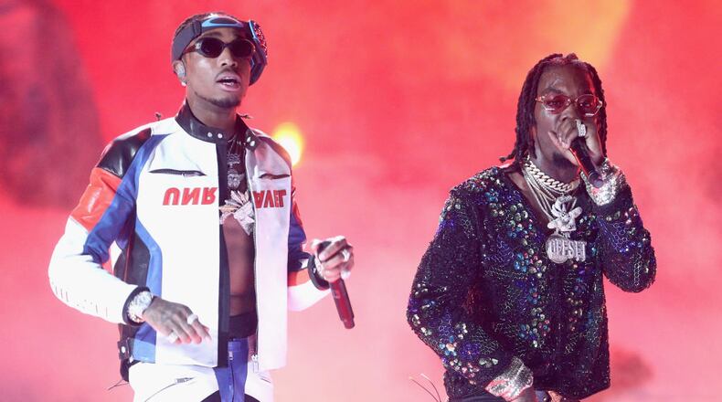 LOS ANGELES, CA - JUNE 25: Quavo (L) and Offset of Migos perform onstage at 2017 BET Awards at Microsoft Theater on June 25, 2017 in Los Angeles, California. (Photo by Frederick M. Brown/Getty Images )
