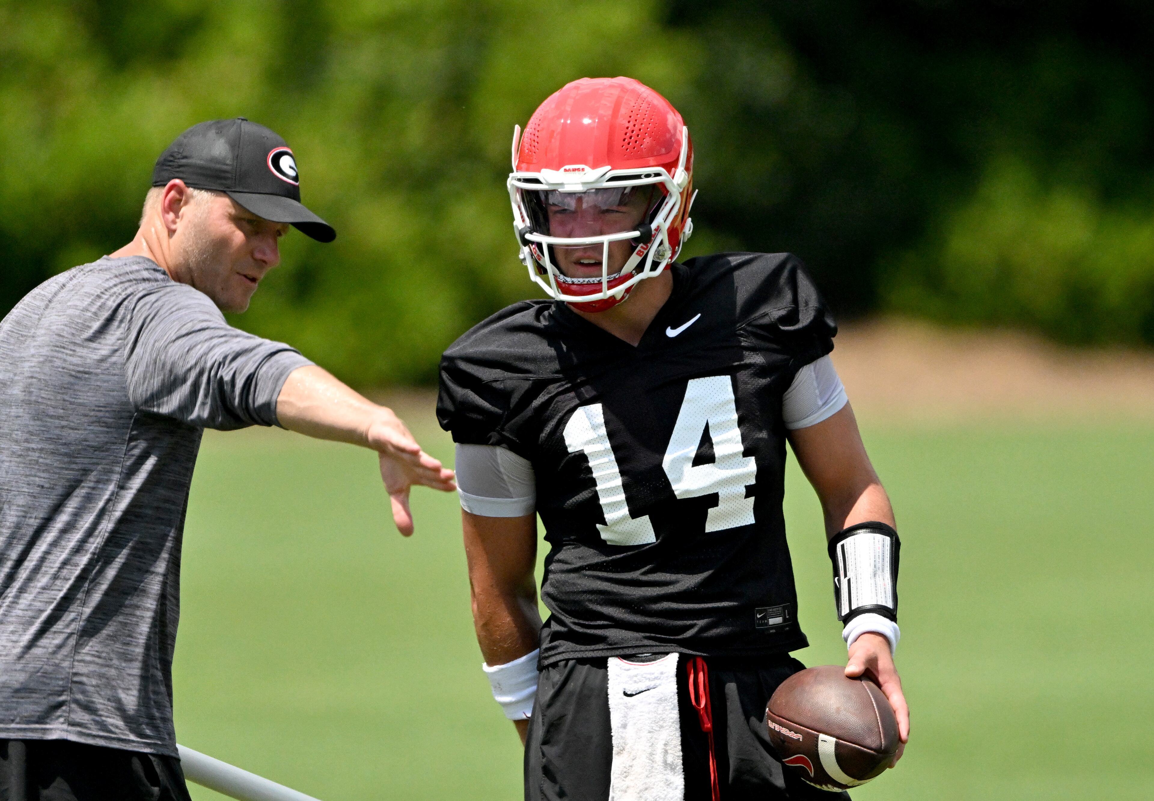 Georgia quarterback Gunner Stockton (14) participates in a football practice at the University of Georgia practice facility, Thursday, July 31, 2025, in Athens. (Hyosub Shin / AJC)