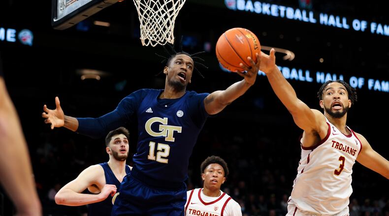 Georgia Tech forward Khalid Moore goes for the ball against USC on Dec. 18 at the Jerry Colangelo Classic at the Footprint Center in Phoenix. Moore has decided to leave the program. (Marlee Smith/Georgia Tech Athletics)