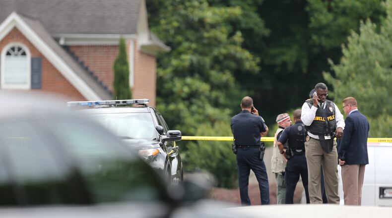According to police, two people were shot to death in Roswell on June 5, 2014.