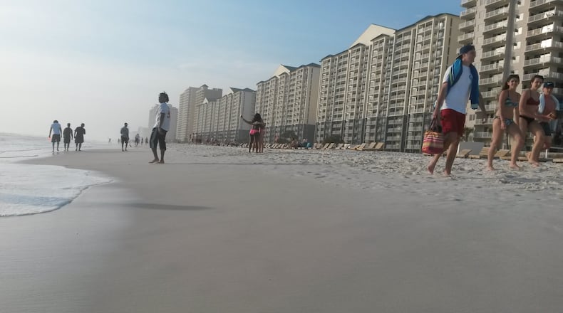 Early spring break crowds in Panama City Beach, Fla., are far smaller than in past years, locals say. The Gulf Coast city put in place new restrictions on alcohol and stepped up law enforcement after troubles during college spring break . MATT KEMPNER / AJC