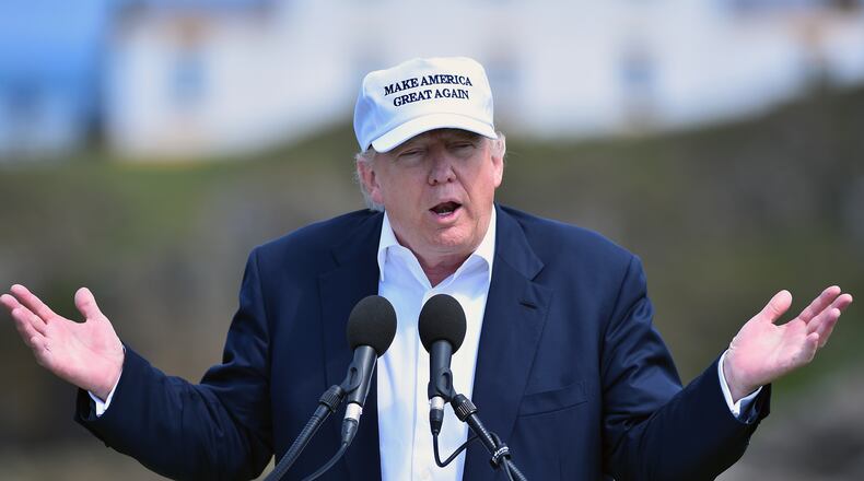AYR, SCOTLAND - JUNE 24: Presumptive Republican nominee for US president Donald Trump gives a press conference on the 9th tee at his Trump Turnberry Resort on June 24, 2016 in Ayr, Scotland. Mr Trump arrived to officially open his golf resort which has undergone an eight month refurbishment as part of an investment thought to be worth in the region of two hundred million pounds. (Photo by Jeff J Mitchell/Getty Images)