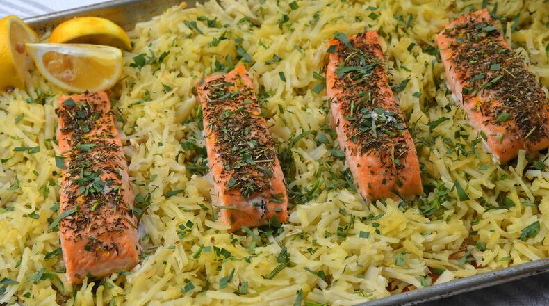 Herb-Rubbed Sheet Pan Salmon and Potatoes. (CHRIS HUNT FOR THE ATLANTA JOURNAL-CONSTITUTION)