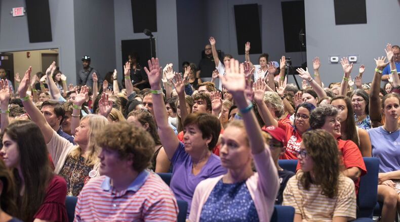 Members of the audience participate during a March For Our Lives rally at Eagles Nest Church in Roswell, Monday, July 30, 2018. (ALYSSA POINTER/ALYSSA.POINTER@AJC.COM)
