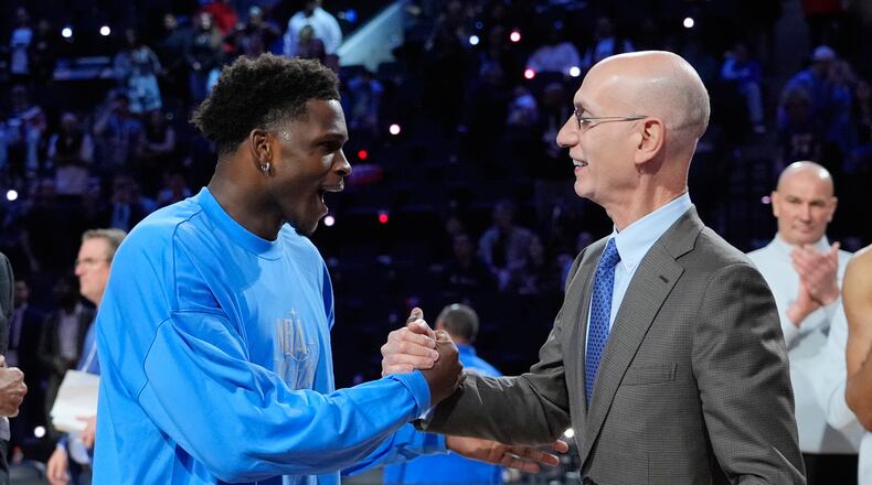 USA Stars guard Anthony Edwards (left) shakes hands with commissioner Adam Silver after the NBA All-Star Game on Sunday, Feb. 15, 2026 in Inglewood, Calif. (Jae C. Hong/AP)