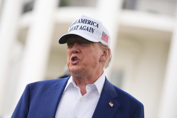President Donald Trump speaks as a flag pole is installed on the South Lawn of the White House, Wednesday, June 18, 2025, in Washington. (AP Photo/Evan Vucci)