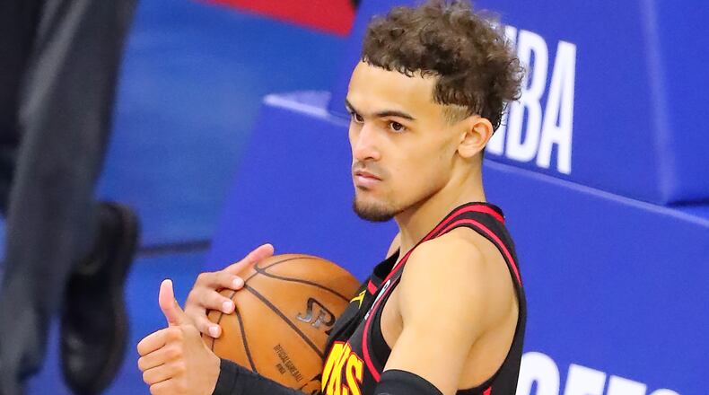 Hawks take 1-0 series lead: Trae Young gives the thumbs up at the end of Sunday's 128-124 victory over the Sixers in Game 1 of the Eastern Conference semifinals.