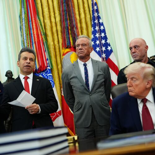 Dr. Marty Makary, commissioner of the Food and Drug Administration, speaks while, from left, National Institutes of Health Director Dr. Jay Bhattacharya, Health and Human Services Secretary Robert F. Kennedy Jr., Joe Rogan, President Donald Trump, Joe Rogan and CEO of Americans for Ibogaine W. Bryan Hubbard listen in the Oval Office of the White House, Saturday, April 18, 2026, in Washington. (AP Photo/Julia Demaree Nikhinson)