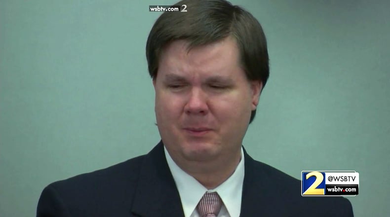 Justin Ross Harris stands and cries as the court lets out for lunch after his defense finished its closing argument during Harris' murder trial at the Glynn County Courthouse in Brunswick, Ga., on Monday, Nov. 7, 2016. (screen capture via WSB-TV)