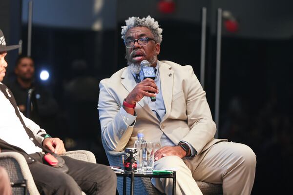 Atlanta Journal-Constitution reporter Ernie Suggs moderates a conversation about Black culture in Atlanta during the AJC’s Unapologetically Black live event at The Gathering Spot on Wednesday, March 22, 2023. (Natrice Miller/AJC)