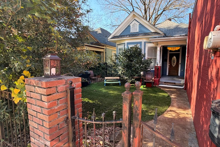 This home, located at 585 Boulevard SE in Grant Park, is the former Georgia Milk Confederation Store and Miss Georgia Dairies ice cream shop. The home is one of 10 on this year’s Grant Park Candlelight Tour of Homes. (Courtesy of Grant Park Candlelight Tour of Homes)