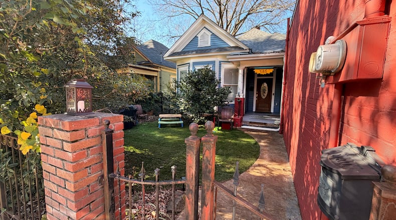 This home, located at 585 Boulevard SE in Grant Park, is the former Georgia Milk Confederation Store and Miss Georgia Dairies ice cream shop. The home is one of 10 on this year’s Grant Park Candlelight Tour of Homes. (Courtesy of Grant Park Candlelight Tour of Homes)