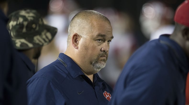 Dunwoody Wildcats head coach Mike Nash watches his team against the Carver Panthers at Lakewood Stadium in Atlanta on Friday Sept. 11th, 2015. Carver was ahead 38-0 in the second quarter. (Photo by Phil Skinner)