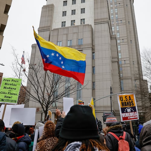 People protest outside Manhattan Federal Court before the arraignment of Venezuelan President Nicolas Maduro, Monday, Jan. 5, 2026, in New York. (AP Photo/Stefan Jeremiah)