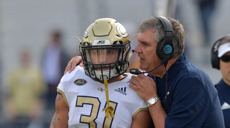 November 17, 2018 Atlanta - Georgia Tech head coach Paul Johnson instructs Georgia Tech running back Nathan Cottrell (31) in the first half at Bobby Dodd Stadium on Saturday, November 17, 20. HYOSUB SHIN / HSHIN@AJC.COM