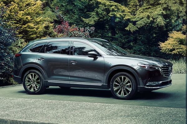 This photo provided by Mazda shows the 2022 CX-9.The CX-9 is one of the more distinctive three-row midsize SUVs, prioritizing style and a rewarding driving experience. (Courtesy of Mazda North American Operations via AP)