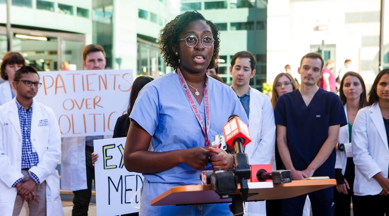 Janice Bonsu, MD, MPH, speaks during a press conference in front of Grady Memorial Hospital in Atlanta on Tuesday, September 27, 2022, held by doctors and healthcare professionals concerned with the closure of Atlanta Medical Center. Due to limited space and resources at Grady Memorial Hospital, the group called on state officials to approve Medicaid expansion to mitigate the effects of Atlanta Medical Center's closure. PHOTO by CHRISTINA MATACOTTA FOR THE ATLANTA JOURNAL-CONSTITUTION.