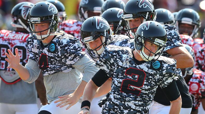 Falcons quarterback Matt Ryan leads the team through a agility drill during Military Day at team practice on Sunday, August 6, 2017, in Flowery Branch. Curtis Compton/ccompton@ajc.com