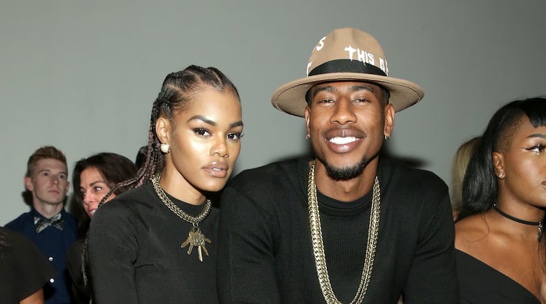 NEW YORK, NY - SEPTEMBER 12: Actress Teyana Taylor (L) and NBA player Iman Shumpert attend the Globe Fashion Week X China Moment fashion show during New York Fashion Week: The Shows at Art Beam on September 12, 2016 in New York City. (Photo by Mireya Acierto/Getty Images for New York Fashion Week: The Shows)