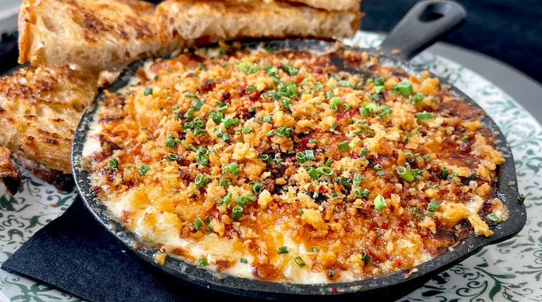 The Gulf blue crab gratin at Lapeer Steak & Seafood has both down-home comfort and decadence. Courtesy of Lapeer Steak & Seafood