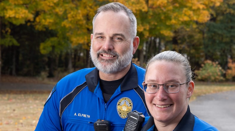 Portrait of Alpharetta Bike Patrol officers Allen Elfreth & Amanda Clay, at Wills Park, who run the iCan Bike camp in Alpharetta. For the Everyday Heroes holiday package. PHIL SKINNER FOR THE ATLANTA JOURNAL-CONSTITUTION