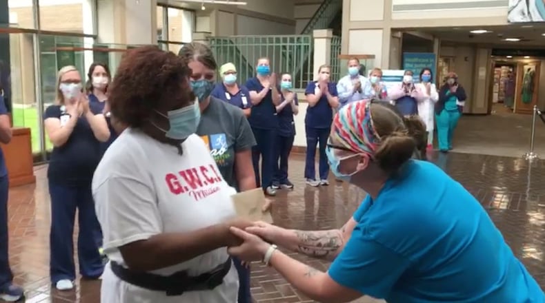 Kim Sloan, an intensive care nurse at Phoebe Putney Memorial Hospital, had a special bond with patient Laconyea Lynn. She made sure to be there when Lynn left the hospital to go home.CONTRIBUTED