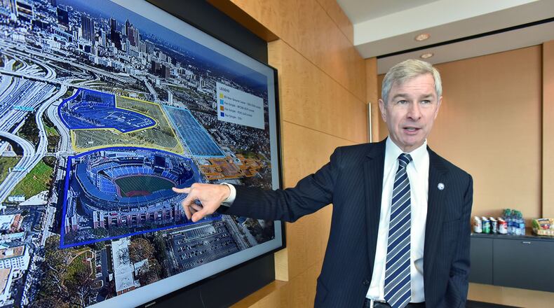 January 10, 2017 Atlanta - Georgia State President Mark Becker speaks at Carter & Associates LLC on Tuesday, January 10, 2017. On Tuesday, Georgia State University and the private development team that acquired the former Atlanta Braves stadium near downtown showed off new renderings showing the design concepts of what they hope to build on the 68-acre site.