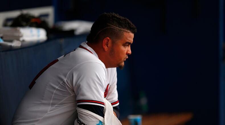 Williams Perez #61 of the Atlanta Braves sits in the dugout in the first inning against the New York Yankees at Turner Field on August 28, 2015 in Atlanta, Georgia. (Photo by Kevin C. Cox/Getty Images)