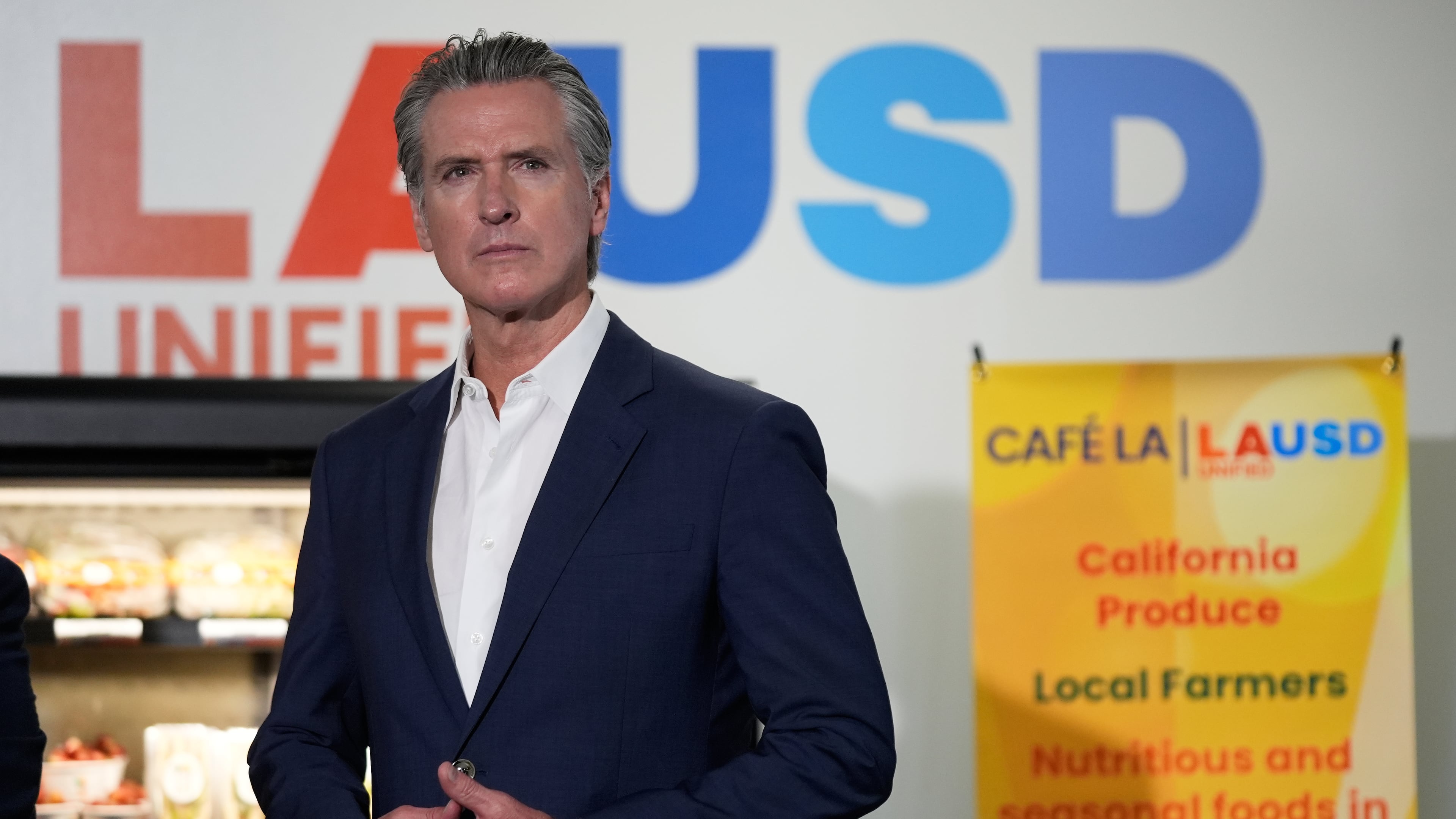 Gov. Gavin Newsom prepares to speak at a news conference at Belvedere Middle School, Wednesday, Oct. 8, 2025, in Los Angeles. (AP Photo/Damian Dovarganes)