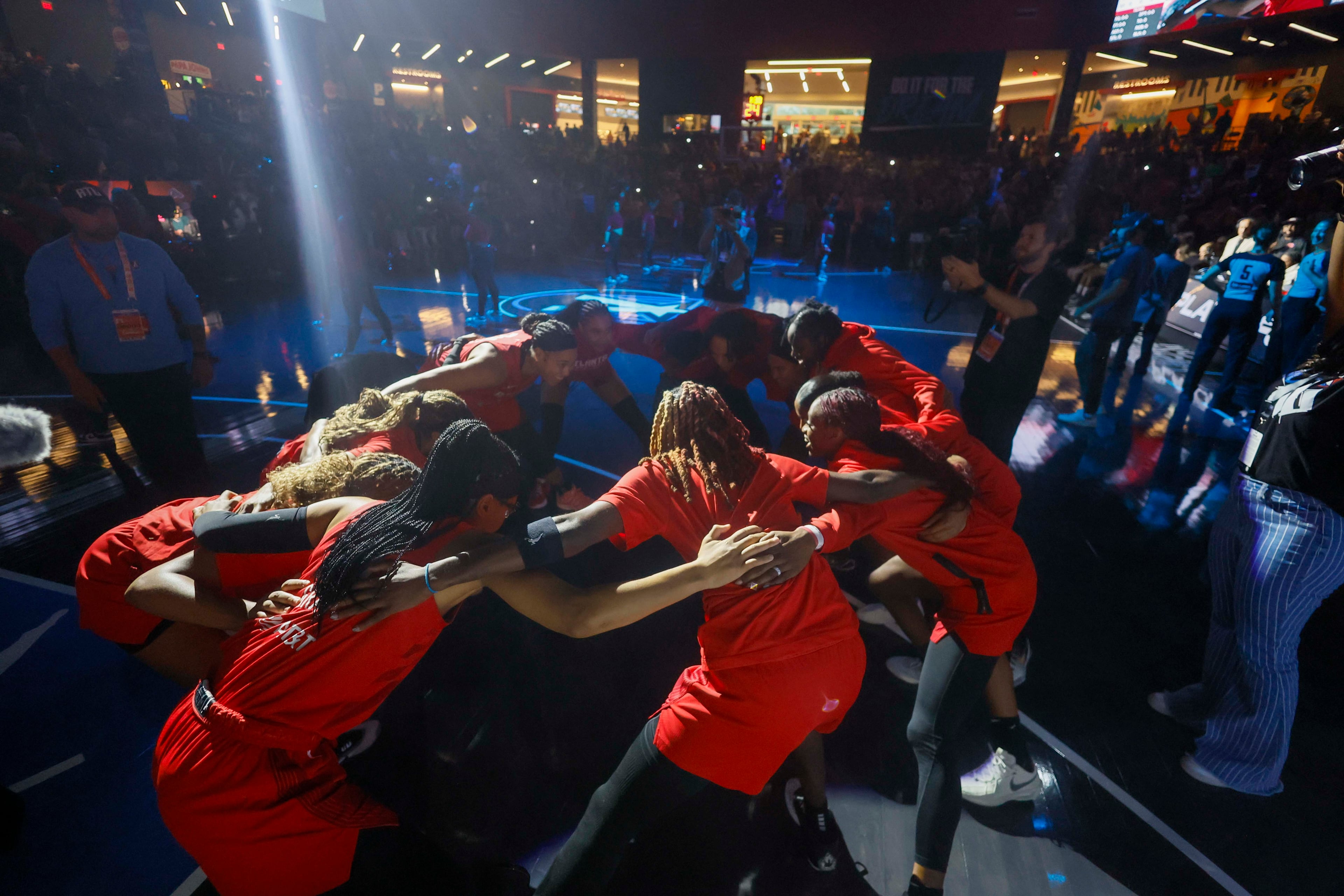 Atlanta Dream players gather moments before the WNBA basketball first-round playoff game against the Indiana Fever at Gateway Center Arena on Thursday, Sept. 18, 2024, in Atlanta. (Miguel Martinez/ AJC)