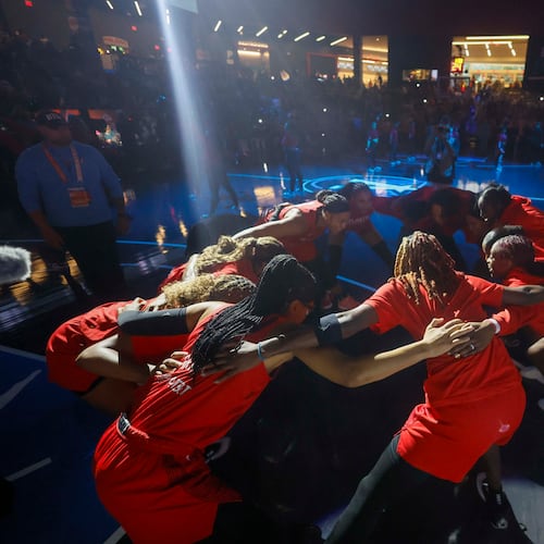 Atlanta Dream players gather moments before the WNBA basketball first-round playoff game against the Indiana Fever at Gateway Center Arena on Thursday, Sept. 18, 2024, in Atlanta. (Miguel Martinez/AJC)