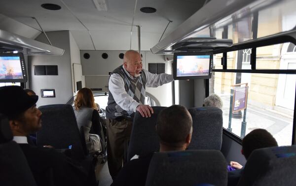 In a 2015 file photo, Tom Houck talks to members of the press as he previews Civil Rights Tours Atlanta. Before the pandemic hit, on the Civil Rights Tours Atlanta, participants go to the site of the famous Atlanta Student Movement Rush Memorial Church, to the graves at South-View Cemetery of Daddy King & John Wesley Dobbs. On stops participants can view up close the house Martin Luther King Jr. lived at the time of his assassination. HYOSUB SHIN / HSHIN@AJC.COM
