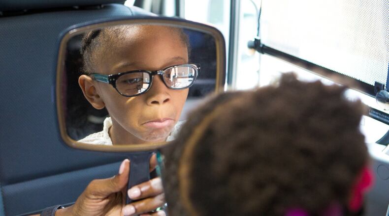 Alexandria Jackson, 6, decides against a certain pair of glasses after a free eye exam in a mobile clinic at the Gwinnett County Public Library in Snellville on Friday, Aug. 2, 2019. The free exams have no income requirement and provide glasses to children who need them. CASEY SYKES FOR THE ATLANTA JOURNAL-CONSTITUTION