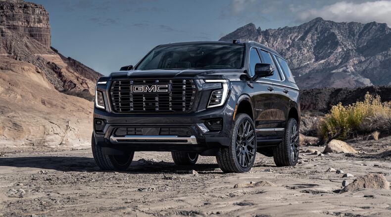 This photo provided by GMC shows the 2026 Yukon. The Yukon is an upscale full-size SUV that can carry people in comfort, haul plenty of cargo, and get impressive mpg with its available diesel-powered engine. (Courtesy of General Motors via AP)