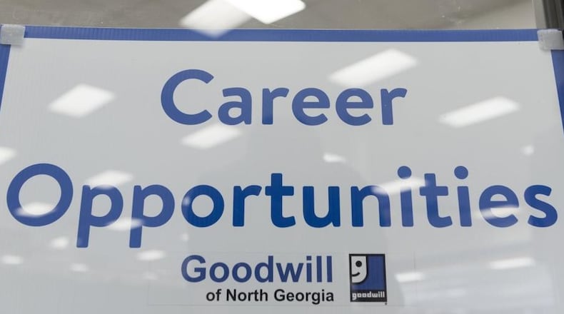 A sign in the window of the Goodwill of North Georgia’s career center in Oakwood, Georgia, in 2017. (DAVID BARNES / DAVID.BARNES@AJC.COM)