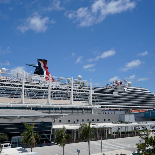 FILE - Carnival Cruise Line's Carnival Horizon cruise ship is shown docked at PortMiami, Friday, April 9, 2021, in Miami. (AP Photo/Wilfredo Lee,File)