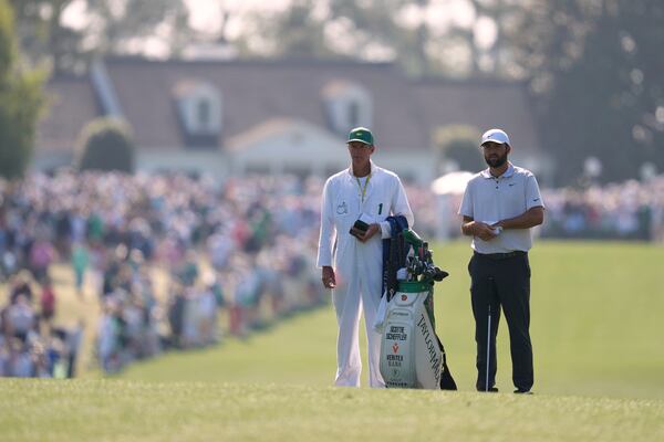 Scottie Scheffler waits to hit on the first hole during the first round at the Masters golf tournament, Thursday, April 10, 2025, in Augusta, Ga. (AP Photo/Ashley Landis)