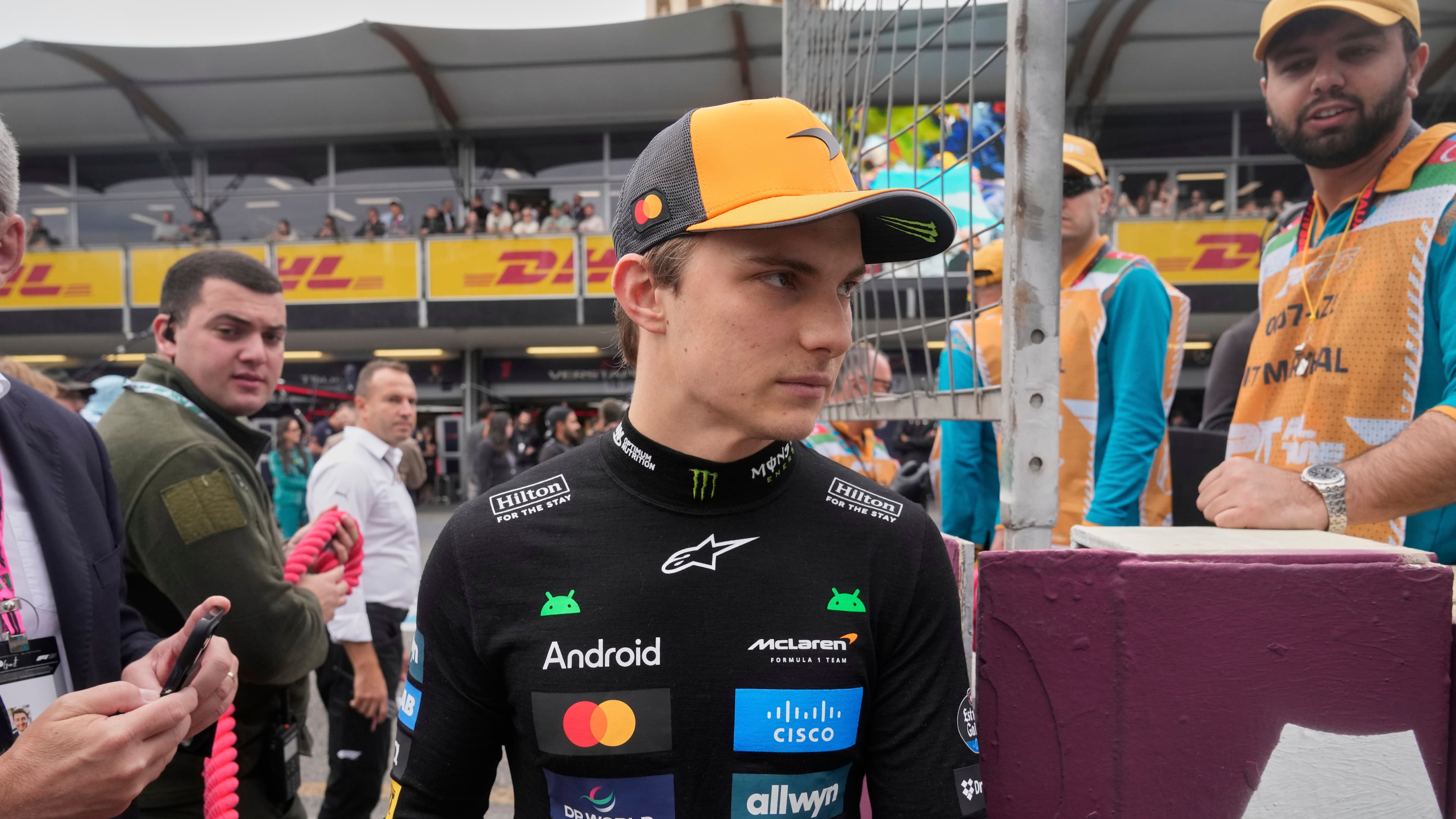 McLaren driver Oscar Piastri of Australia arrives at the starting grid for the Azerbaijan Formula One Grand Prix in Baku, Azerbaijan, Sunday, Sept. 21, 2025. (AP Photo/Darko Bandic)