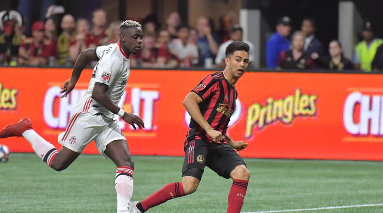 October 30, 2019 Atlanta - Atlanta United midfielder Gonzalo Martinez (10) assists a pass to Atlanta United defender Julian Gressel (24) to score a goal in the first half during the Eastern Conference Final soccer match at Mercedes-Benz Stadium on Wednesday, October 30, 2019. (Hyosub Shin / Hyosub.Shin@ajc.com)
