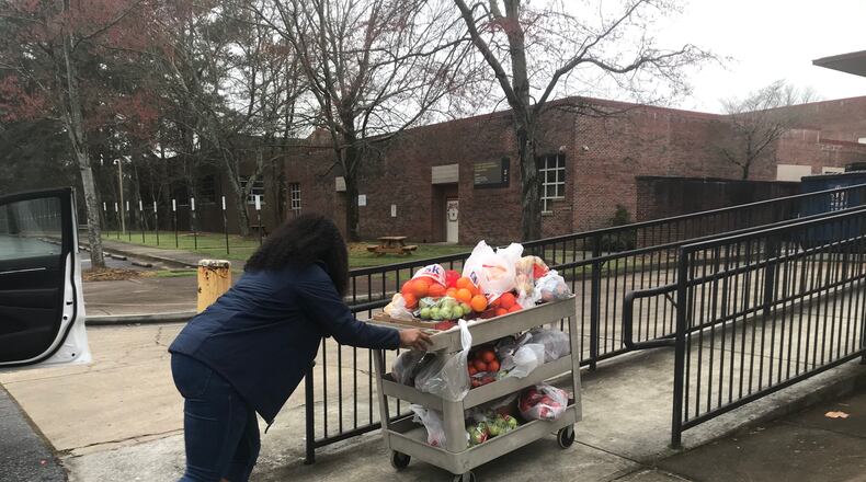 Atlanta Public Schools  has added more food distribution sites to feed students while school buildings are closed to contain the spread of the coronavirus. VANESSA McCRAY/AJC
