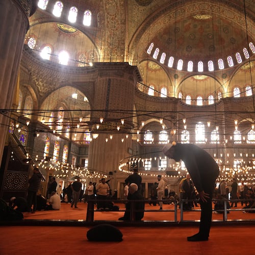 Muslims pray at the Ottoman-era Sultan Ahmed or Blue Mosque, in Istanbul, Turkey, Friday, Nov. 21, 2025, ahead of the visit of Pope Leo XIV to Turkey. (AP Photo/Francisco Seco)