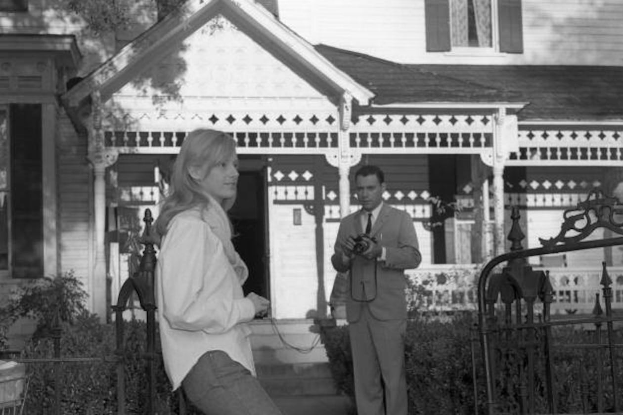 The film adaptation of Carson McCullers' "The Heart is a Lonely Hunter" was released in 1968 to great acclaim. The AJC's Floyd Jillson was there for filming in Selma, Ala., and shot a series of behind the scenes shots. Here, actor Alan Arkin (right) takes photographs of co-star Sondra Locke (front) on the set. Arkin and Locke both earned Oscar nominations for their roles. FLOYD JILLSON / AJC PHOTO ARCHIVES