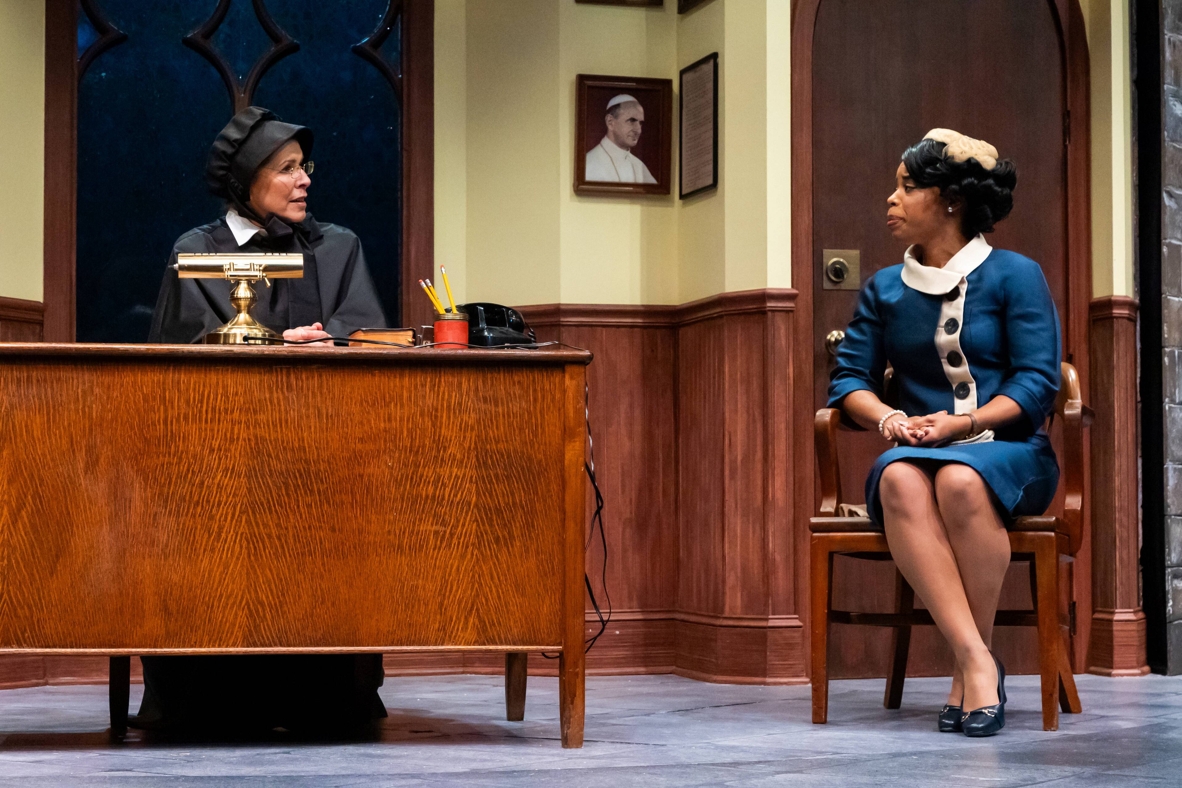 Sister Aloysius (left), played by Tess Malis Kincaid, has an intense scene with Mrs. Muller (Tiffany Denise Hobbs), the mother of a student who may have been subjected to wrongdoing by Father Flynn, in "Doubt: A Parable." (Courtesy of Casey Gardner Ford)